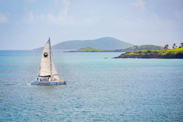 a small boat in a large body of water